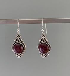 Silver Ruby Earrings With Birthstone, Oval Pendant Gemstone Earrings For Gift, Silver Garnet Birthstone Earrings, Gemstone Earrings With Oval Pendant For Gifts, Oval Ruby Earrings Gift, Handmade Oval Cabochon Earrings For Gift, Sterling Silver Oval Cabochon Earrings Gift, Garnet Earrings Silver, Garnet Drop Earrings