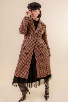 You didn't expect us to design just dresses, right? Meet our first official Ivy City Coat! The Tabitha Coat was designed to take your breath away with a beautiful houndstooth print, double breasted buttons, long sleeves, and a length that is to die for! SIZING TIP: These coats are running snug. We recommend sizing up 1-2 sizes to wear with sweaters. For a better fit, measure yourself and compare your measurements to the size chart. *Please note: For sizes XL to 5X, there is added length making t Brown Double-breasted Outerwear For Office, Winter Houndstooth Double-breasted Blazer, Brown Houndstooth Winter Outerwear, Tailored Double-breasted Houndstooth Outerwear, Plaid Wool Coat For Fall Workwear, Elegant Brown Houndstooth Outerwear, Double-breasted Brown Wool Coat For Work, Brown Double-breasted Blazer For Fall, Double-breasted Houndstooth Blazer