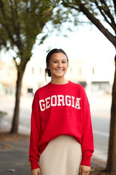 Our Georgia Sweater is such an adorable top! It is made of the softest fibers and has a slight oversized fit. This is perfect for those cooler autumn/winter days! - Crew neck - Long sleeves - Soft fibers - Slight oversized fit - Material: 52% Viscose | 28% Polyester | 20% Nylon - Model is 5’6" & wears a small. She is wearing a small in this sweater. Color Disclaimer: Actual colors may vary due to computer monitors. *Measurements are taken flat and then doubled.* Size Bust Length Sleeve Small 47" Maxi Tops, Skirts For Kids, Shoes Sandals Heels, Winter Days, Sweater Set, Grab Bags, Winter Day, Computer Monitors, New Arrival Dress