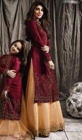 Shilpa Shetty Maroon Color Raw Silk Lehenga Choli Dress #bollywoodsuitsonline #bollywooddesignerdresses2017 Embrace timeless elegance just like Shilpa Shetty dressed in this maroon color raw silk lehenga choli dress. The ethnic lace, patch and resham work over a dress adds a sign of attractiveness statement with a look. USD $ 149 (Around £ 103 & Euro 113) Dress From Saree, Fashion Indian Dresses, Indian Dresses Salwar Kameez, Mom Daughter Dress, Bollywood Suits, Eastern Wear, Choli Dress, Daughter Dress, Raw Silk Lehenga