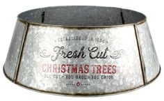 a metal tin can with christmas trees printed on the side and words that read fresh cut