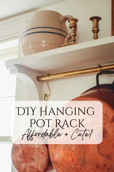 pots and pans are hanging on the wall with text overlay that reads diy hanging pot rack