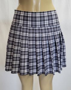 "JUNIOR TO PLUS SIZE \"Graymatter\" PLAID MINI SKIRT 14\"-16\" LONG. TO ENSURE YOU ORDER THE CORRECT SIZE SKIRT, PLEASE READ THIS CAREFULLY; THEN MATCH IT WITH SIZES. ALL OUR SKIRTS ARE ALWAYS MADE WITH A 3\" LONG WAITSBAND + THE LEGNTH OF THE SKIRT. OUR SKIRTS ARE ALL MADE TO ORDER AND THE LENGTH MAY SLIGHTLY CHANGE A FEW CENTIMETERS, BUT WE TRY TO BE AS ACCURATE AS POSSIBLE.  BELOW IF THE FINAL LENGTH OF THE SKIRT. *XSMALL - Waistband measures 28\" around when fully closed. Skirt is 14\" long Gray Lined Skort Of Short Length, Gray Lined Skort Short Length, Casual Fitted Plaid Skort, Gray Short Length Lined Skort, Gray Short Length Skort, Gray Pleated Skort, Grey Pleated Short Skort, Casual Fitted Plaid Mini Skirt, Fitted Gray Mini Skirt Casual