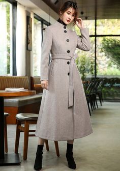 Elevate your winter wardrobe with our Stand Collar Single Breasted Flared Wool Blend Long Coat. Made from a luxurious wool blend, this single breasted coat features a stand collar and belted waist for a chic and flattering fit. The fit & flare style adds a touch of sophistication, making this long coat a must-have for any fashion-forward woman. Stay warm and stylish all season long! ●Single-breasted button closure●Stand collar ●Lined ●Front welt pockets ●Removable tie belt ●50% wool and polyeste Winter Coat For Women, Gray Cashmere, Coat Autumn, Coat For Women, Single Breasted Coat, Wool Blend Coat, Woolen Coat, Cashmere Coat, Winter Coats Women