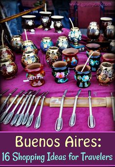 a table topped with lots of different types of utensils and spoons next to each other