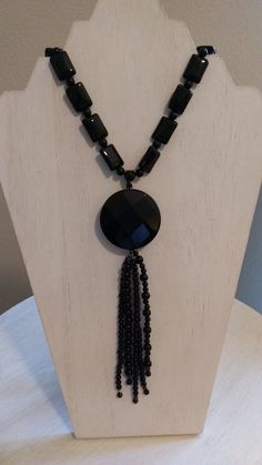 This elegant Black Onyx Tassel Necklace is approximately 33 1/2 inches long and has a silver hook closure. Elegant Black Tassel Necklace, Elegant Black Lariat Long Necklace, Elegant Black Tassel Necklace For Party, Villa Rica, Beaded Necklaces, Black Onyx, Tassel Necklace, Necklace Etsy, Onyx