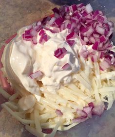 onions and cheese are mixed together in a bowl