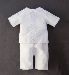 "Nice Christening White Baby Boy Suit. Made from soft pure polished cotton and cotton lace. It looks very nice and glitters elegantly. Cotton lace has a silver thread in the pattern. It is our new spring model outfit. The photo of the boy is in the file to demonstrate how the suit could fit. In a few weeks will be ready new photos of one of our models in a new outfit with silver thread. This outfit, suit, hat, blanket, booties have lace with silver thread in the pattern. The outfit includes a sh White Fitted Onesie For Baptism, Boy Baptism Outfit Catholic, Traditional White Baptism Sets, White Embroidered Sets For Baptism, Cotton Baptism Sets, Outfit Suit, Suit Hat, Baby Boy Suit, Boy Baptism Outfit