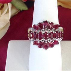 Genuine Faceted Oval, Marquee, And Pear Shaped African Ruby Ring ( 4.81 Cts ) Enhanced By Faceted Round Cambodian Zircon ( 0.19 Ct ) Set In Platinum Over 925 Sterling Silver. Nwot. Total 5.00 Cts. Est Retail $ 875. It Measures Approximately 3/4" L (North And South) And Side To Side ( East To West) Measurement Is 15/16" Red Ruby Diamond Multi-stone Ring, Red Ruby Multi-stone Ring With Diamonds, Cluster Ruby Ring With Diamonds, Red Multi-stone Diamond Jewelry, White Ruby Ring With Diamond Accents, Cluster Red Multi-stone Ruby Ring, Cluster Red Ruby Ring With Multi-stones, Cluster Ruby Rings In Red, Red Multi-stone Cluster Jewelry