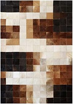 a brown and white rug with squares on it