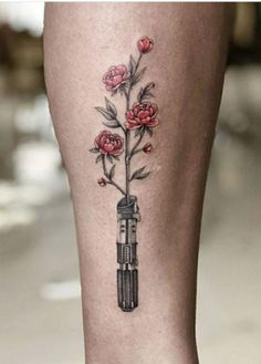 25 Star Wars Tattoo Ideas That You Will Absolutely Adore Starwars Tattoo Girly, Starwars Flower Tattoo, Nerd Tattoos For Women, Lightsaber Flower Tattoo, Star Wars Flower Tattoo, Star Wars Tattoo Aesthetic, Star Wars Tattoo For Women