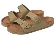 Birkenstock Arizona Vegan Canvas - Shoes : Faded Khaki Canvas : Understanding Widths: The Regular icon (outlined foot) accommodates Regular to Wide. The Narrow icon (filled in foot) accommodates Narrow to Regular widths. The Arizona Vegan Canvas is a non-leather version of everyone's favorite Birkenstock sandal. Canvas uppers feature dual adjustable straps with antiqued hardware. The microfiber-lined contoured cork footbed will mold to the shape of your foot creating a custom footbed that suppor Birkenstock Sandal, Birkenstock Sandals, Good Posture, Birkenstock Arizona, Us Man, The Vamps, Fashion Flats, Canvas Shoes, Slip On Sandal