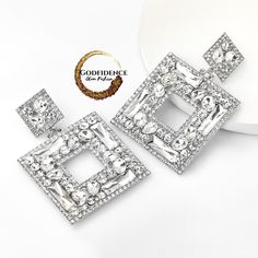 Exquisitely designed square-shaped dangle earrings add just the right touch to an evening on the town. These earrings are top notched and perfectly curated with the right mix of Glitz and Glam. Must have earrings of the year! Postback dangle earrings. These earrings are a Big and Glamourous! Length- 3.38" Width- 2.24" Baroque Jewelry, Popular Earrings, Party Mode, Wedding Party Jewelry, Sparkly Earrings, Square Diamond, Deco Jewelry, Women Diamond, Square Earrings