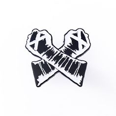 two black and white crossed arrows stickers on a white backgroung background