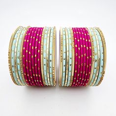 Beautifully designed bangles for any occasion. South asian bracelets come in a variety of styles, colors, and finishes. We at Banglez take creating the perfect bangle set for you to another level! You could say helping you find your favorite stack of bangles as one of our greatest missions. This bangle set was curated in house by one of our talented team members. We hope you love them as much as we do! Adjustable Round Cuff Bracelet For Festive Occasion, Traditional Pink Round Bracelets, Pink Bangle Jewelry For Festival, Traditional Adjustable Pink Bangle, Bohemian Stackable Bangle For Party, Stackable Bohemian Bangle For Party, Pink Bohemian Bangle For Party, Handmade Adjustable Pink Bangle, Traditional Pink Bangle For Gift