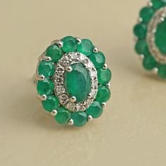 Gold(14K) : 4.90gBrilliant cut Diamonds (VS clarity & H-I colour) : 0.30ctGemstones : Emerald Emerald Earrings Real, Luxury Blue Emerald Earrings, Luxury Hand-set Emerald Earrings, Ear Tops, Green Emerald-cut Earrings With Diamond Accents, Luxury Green Emerald-cut Earrings, Blue Sapphire Studs, Stackable Ring Sets, Instagram Famous