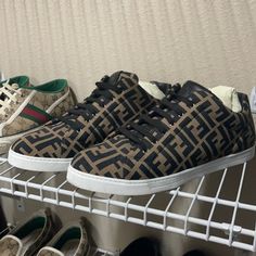 Fendi Low-Top Sneaker With Allover Ff Logo Print. 1" Heel. Round Toe. Lace-Up Front. Leather Logo Patch At Tongue. Rubber Sole. Made In Italy. Runs Large Will Come With Duster Bag And Box Paid $775 + Tax Us 11.5 Eur 10 Low Top Sneakers, Low Top, Black And Tan, Mens Shoes Sneakers, Patch Logo, Top Sneakers, Shoes Sneakers, Men's Shoes, Fendi