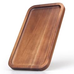 an empty wooden tray on a white background