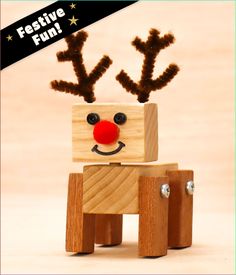 a wooden toy with reindeer's head on it