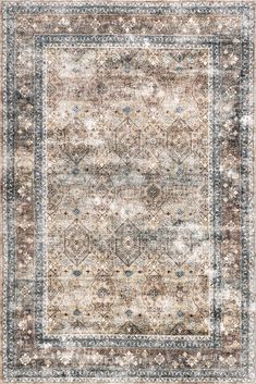 an area rug with various colors and patterns on it, including brown, blue, beige and