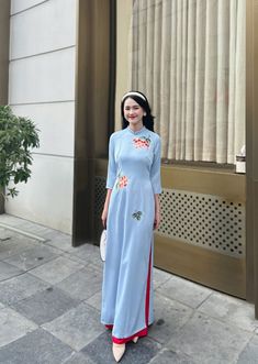 Vietnamese Ao Dai with sharp 3D printed motifs on silk fabric. Slim and lightweight design enhances the female figure. High quality silk material, slight stretch, very light and comfortable to wear. Full Length Floral Embroidered Dress, Full Length Silk Dress For Spring, Traditional Long Maxi Dress For Spring, Traditional Light Blue Spring Dress, Full Length Spring Dress With Floral Embroidery, Spring Floral Embroidered Full Length Dress, Blue Ao Dai For Summer, Spring Floral Embroidery Full Length Dress, Elegant Full-length Ao Dai For Summer