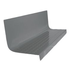 a gray plastic shelf with holes on the bottom