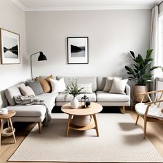 a living room filled with furniture and a white rug on top of a hard wood floor