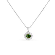 A 1.21 Carat Round-Cut Green Tourmaline set with  diamond pave setting weighing 0.24 Carat set in 18K White gold  
The Pendant design can be customized to suit your particular taste &amp; budget with any Size, Color &amp; Clarity Combination of Certified Natural Diamond or Gemstone in 14/18K gold or Platinum.
 
I offer a Free virtual Consultation from the comfort of your home. So you can personally get to know me, and in which I will give you the tools and resources a Elegant Green Diamond Round Necklace, Green Diamond Round Cut Necklaces, Green Hallmarked Diamond Necklace Fine Jewelry, Green Diamond Round Pendant Necklace, Exquisite Green Pendant Diamond Necklace, Zipper Bracelet, Diamond Flower Pendant, Halo Necklace, Tourmaline Pendant