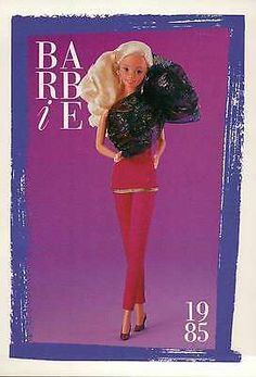 the barbie doll is wearing red pants and a black top