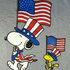 snoopy and the american flag on a gray shirt