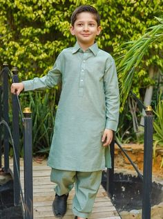 2 Piece Kurta Shalwar for Boys. A light green cotton chambray kurta shalwar two piece outfit for your adventurous lad this summers to keep him cool and stylish. Description Kurta (Shirt) :  Light Green Chambray Cotton Kurta Shalwar (Trouser) : Light Green Chambray Cotton Shalwar Country of Origin : Made in PAKISTAN General Care Instruction : Should be washed in gentle cycle and hung to dry. Color may bleed so please be mindful of other items with it. General Disclaimer: Size chart provides refer Kurta Shirt, Green Boys, Boys Kurta, Kurta Dress, Mommy Daughter, Cotton Kurta, Modest Wear, Kids Boxing, Family Outfits