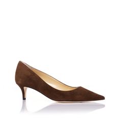 Reintroducing a timeless staple, the Classic Pump in chocolate. This chocolate pump is made from luxurious suede that emphasizes elegance in a classic design. A nearly 2-inch (45mm) pump gives this high heel just enough lift.Handcrafted with exquisite attention to detail from fine suede, this shoe emphasizes comfort with our patented Triple I ™ signature invisible insole, designed by Marion Parke, a licensed Podiatrist. The suede will conform to your foot the more you wear it, which makes this s Comfortable Pumps, Color Chocolate, Classic Pumps, Red Suede, Work Wardrobe, High Heel Pumps, Soft Suede, Edgy Fashion, Luxury Shoes