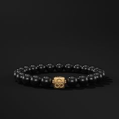 Here is possibly one of the best essential beaded bracelets in the world.It is the result of the fusion between traditional craftsmanship and centuries-old wisdom and the latest trends. In addition to more than 30 years of adventures searching the world for valuable and unique minerals.Natural stones full of history, cultures and power combined with our iconic square piece with the Seekers® logo. Crafted in noble metals such as silver, gold and black gold as symbols of wealth and personality. Ch Classic Black Beaded Bracelets For Everyday, Luxury Black Bracelets For Everyday, Timeless Black Bracelets For Everyday, Timeless Black Everyday Bracelets, Classic Black Beaded Bracelets, Classic Bracelets With 8mm Beads For Everyday, Classic Everyday Bracelet With 8mm Beads, Elegant Onyx Stretch Bracelet With 8mm Beads, Classic Onyx Bracelets With Round Beads