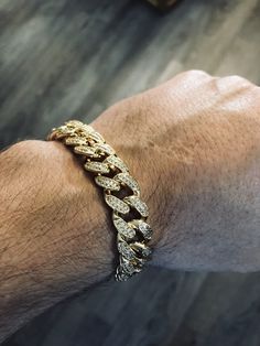 FAST SHIPPING!*TRUSTED SELLER**2300+ TRANSACTIONS* -Will be shipped through USPS with First Class Mail that includes tracking so you'll get it quick! -Don't confuse this with those cheap low quality cuban links that have glued in stones. -Premium 14k white gold OR yellow gold plated diamond cuban link Bracelet! -Plating is PVD which is the highest quality. -Stones are high quality VVS simulated lab diamonds(CZ)! Hand prong set and not glued in like the cheap ones! -Very nice box clasp! -12mm wid Gold Iced Out Cuban Link Bracelet, Miami Cuban Link Bracelet, Yellow Gold Iced Out Cuban Link Bracelet, Gold-plated Cuban Link Bracelet, Yellow Gold-plated Cuban Link Bracelet, Miami Cuban Link, Miami Cuban, Cuban Link, Lab Diamonds