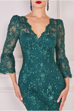 Experience exquisite charm with our Lace Scallop Midi Dress. This emerald dress is designed for those seeking timeless allure, featuring intricate scalloped detailing along the neckline, sleeve, and hem. The alluring v-neckline and sheer lace sleeve embrace a bodycon fit that effortlessly accentuates your silhouette. From dinners to date nights, and even special occasions like weddings, this emerald dress is your go-to for a range of semi-formal events. The delicate lace and thoughtful scalloped Dresses By Texture, Emerald Dress, Clothing Pattern Design, Lace Dress Design, Emerald Dresses, Green Lace Dresses, Elegant Dresses Classy, Lace Bodycon, Date Nights