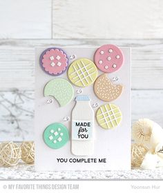 a card with buttons on it that says made for you, you complete me in the center