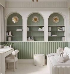 a living room filled with white furniture and green wall coverings on either side of the windows