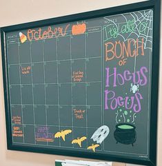 a chalk board with halloween writing on it