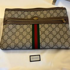 Authentic Gucci Pouch Comes With Dust Bag, Box And Ribbon. Purchased In Aspen, Co At Gucci Store. I No Longer Have Receipt. 11 X 8 Inches. One Outside Zipper , Small Marks From Pen Inside Pouch , Overall Condition Very Good. No Lowball Offers , Price Firm. Gucci Pouch, Gucci Store, Bags Gucci, Gucci Bags, Aspen, Gucci Bag, Dust Bag, Bag Lady, Pouch