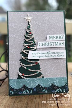 a card with a christmas tree on it