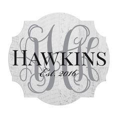 the logo for hawkins est 2010, which has been painted on white wood