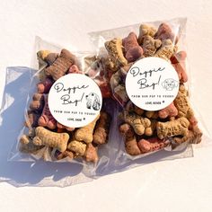 two bags filled with different types of dog treats