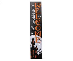 a welcome sign is hanging on the wall in front of a white background with black and orange lettering