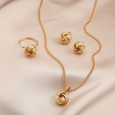 Unleash Timeless Elegance With Our 14k Boho Chic Jewelry Set. This 4-Piece Ensemble, Including Ear Studs, Necklace, And Ring With Braided Pendant, Elevates Any Look Effortlessly. Crafted In Luxurious 14k Gold, Each Piece Exudes Sophistication, Perfect For Impressing Your Crush With Effortless Charm. Jewelry Knots, Gold Jewelry Sets, Studded Necklace, Boho Chic Jewelry, Boho Style Jewelry, Symbolic Jewelry, Necklace Ring, Fashion Jewelry Sets, Knot Earrings