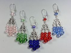 These Pretty Earrings have Triple Dangling 8mm and 6mm Rhondelle Shaped Crystal Beads with an Aurora Finish making them Extra Sparkly. They are firmly attached to Fleur-de-lie Style Tibetan Silver Centers. They are available in 5 colors : Pink, Green, Colbalt Blue, Red and Light Blue.  They are 2-1/8 inches long (not including the Silver Plated Kidney Style ear wires) and are relatively light weight considering their size. It's possible for me to make the same style of earrings in Other Colors o Cheap Crystal Earrings With Faceted Beads As Gift, Stud Dangle Earrings, Pumpkins Crafts, Diy Pumpkins, Red And Light Blue, Wire Jewelry Earrings, Diy Earrings Easy, Colbalt Blue, Silver Chandelier Earrings