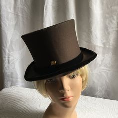 "Vintage Collapsible Brown Top Hat with Dark Brown Velvet Edge Trim and Hat Band with Bow. 71/4 Hand Made Top Hat. Silk Lining. W/ Hat Box. A wonderful addition to a man's Victorian Costume for Christmas Play or Reenacting. Or just use the Original Victorian Top Hat for an Antique Display. The hat is in good shape. Size: 7 1/4 Hat, 10 7/8\" X 13\" X 6\", 24\" Around Inside Edge of Hat.   For other antique and vintage items go to: www.veryvictorianstudio.etsy.com. For sewing related items see my Victorian Top, Hat Silk, Big Butterfly, Oc Inspiration, Victorian Costume, Christmas Play, Brown Velvet, Hat Box, Brown Top