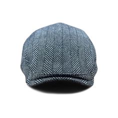 Keep those ears warm in style! A long awaited addition to our scally cap line up is The 'Flap Cap.' This is an adjustable ear-flap cap that boasts insulated lining and versatility—all while maintaining the form fit that makes a Boston Scally Cap truly unique. Whether you fold the flaps in or out, this classic herringbone cap is a new winter classic. Material: Wool/Poly blend Color: Classic Grey Herringbone Style/Fit: Single panel with adjustable ear flaps. Caps will fit like single panels with f