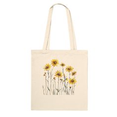 This premium tote bag is made from 100% cotton fabric and features a beautiful watercolour design of Desert Sunflowers, part of our American Wildflower series. It is eco-friendly, strong and durable and has ample space for a variety of uses.  - 10 litre capacity - 100% cotton - Reinforced stitching on handles for more stability Botanical Cotton Canvas Tote Bag, Botanical Cotton Tote Bag, Botanical Cotton Canvas Bag For Daily Use, Botanical Cotton Canvas Bag For Everyday Use, Botanical Style Cotton Tote Bag, White Cotton Canvas Bag With Floral Print, White Floral Cotton Canvas Bag, Cotton Tote Bag With Plant Print, Eco-friendly Cotton Canvas Bag With Floral Print