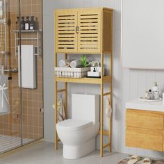 a bathroom with a wooden shelf over the toilet