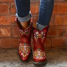 About: The Cowgirl Embroidery Boots are beautifully detailed with colorful floral embroidery etched in pink, purple, teal, orange, yellow and green thread. The 8 inch shaft is the perfect height for sundresses, but the Cowgirl Embroidery Boots will also look amazing with blue jeans. Handcrafters seriously brought these little cowgirl boots to life. If you are looking to make a bold statement, step into the cowgirl boots and you’ll be turning heads for sure. Specs: Fits true to size, take your no Fall Festival Ankle-high Boots, Red Casual Boots For Festival, Casual Red Boots For Festival, Embroidered Mid-calf Boots With Round Toe For Fall, Red Western Mid-calf Boots For Winter, Bohemian Mid-calf Boots With Round Toe For Fall, Embroidered Boots For Spring Festivals, Red Bohemian Boots For Fall, Spring Festival Embroidered Boots